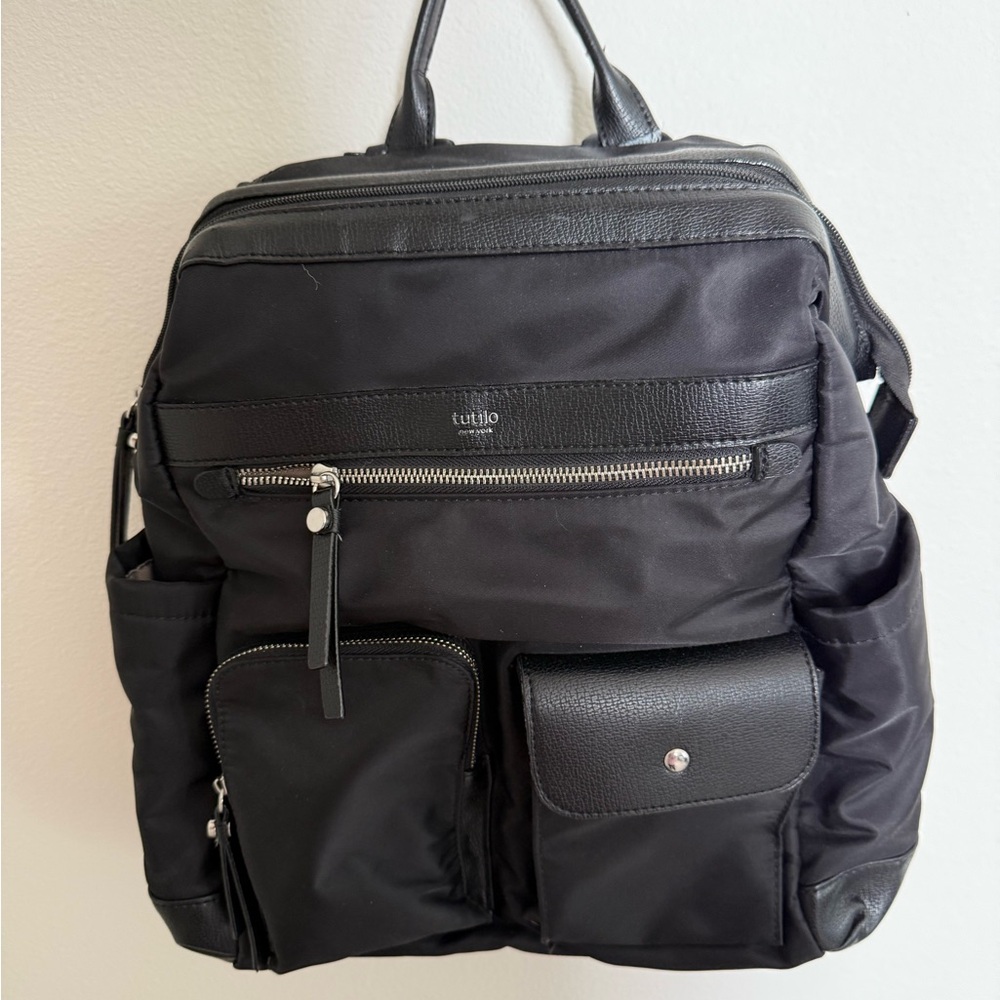 Black Backpack with Structured Design and Water-Resistant Nylon